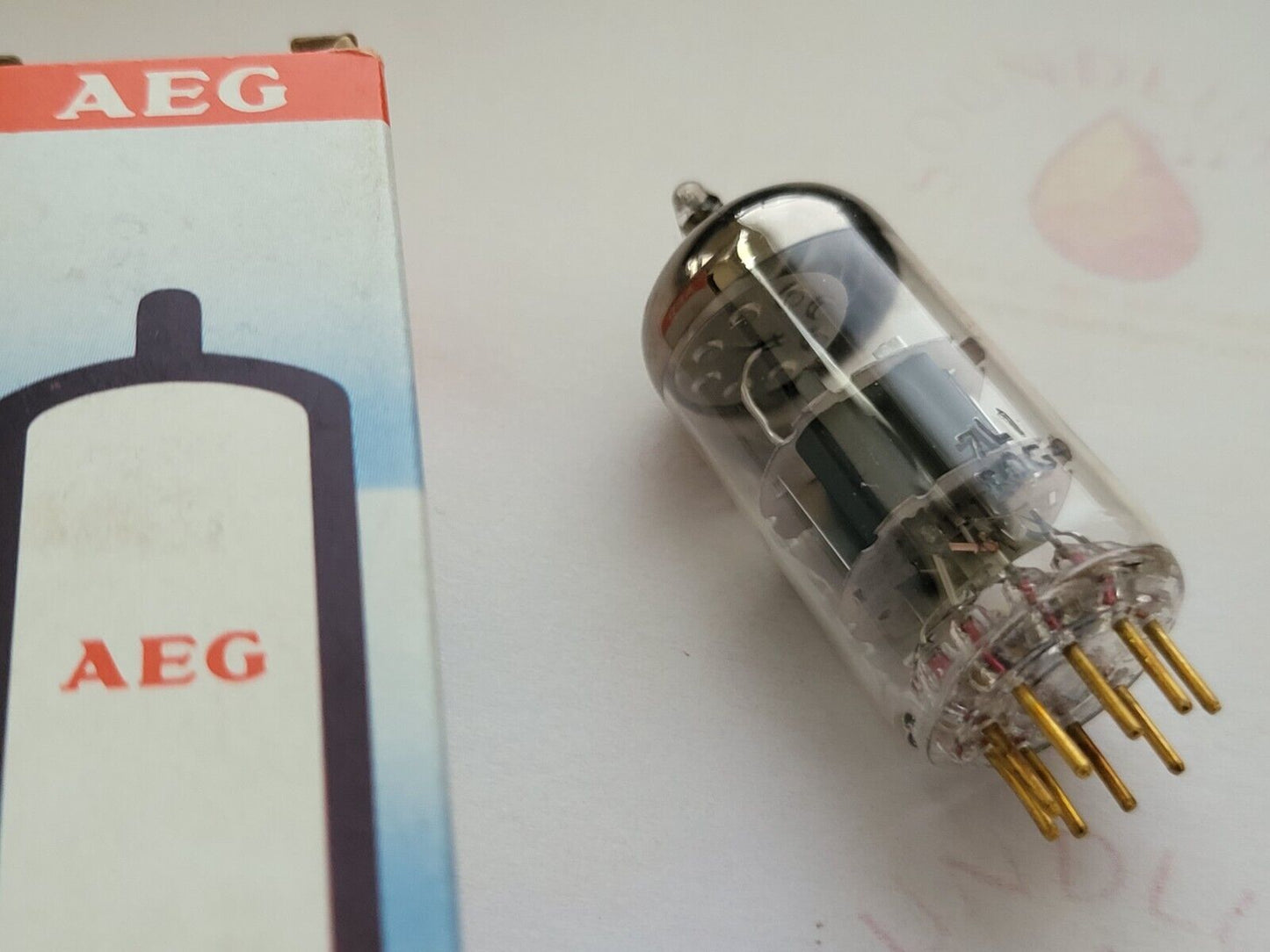 1x Mullard E88CC 6922 Dimple Disc Getter - Mitcham 1970 - AEG Label - NOS