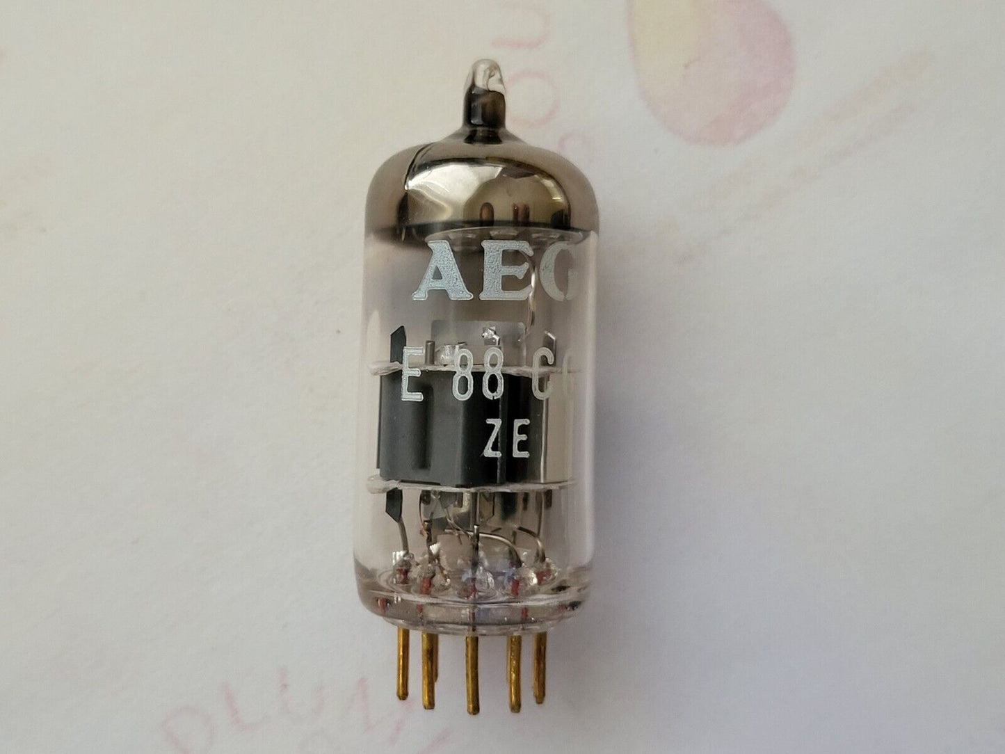 1x Mullard E88CC 6922 Dimple Disc Getter - Mitcham 1970 - AEG Label - NOS